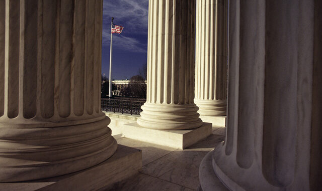 120414_04P_EC Colonnade of the United States Supreme Court Building