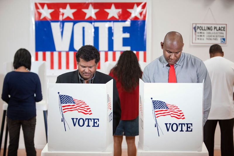 Voters voting in polling place