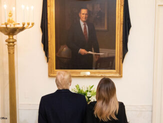 President and Malania Trump viewing portrait of the late President Bush displayed in The White House