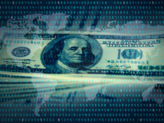 Image of a $100 bill in front of a digitized background with a world map