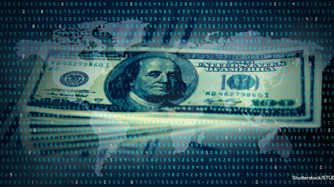 072219_01P_FS Image of a $100 bill in front of a digitized background with a world map