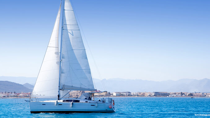 sailboat sailing in Mediterranean sea in Denia blue Mediterranean sailboat sailing in Mediterranean sea in Denia blue Mediterranean