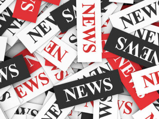 red, black, white "news" elements in a jumbled pile