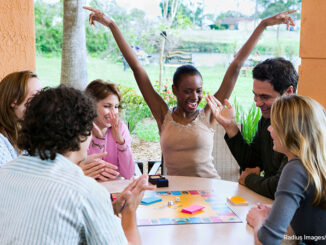 Group of People Playing A Board Game