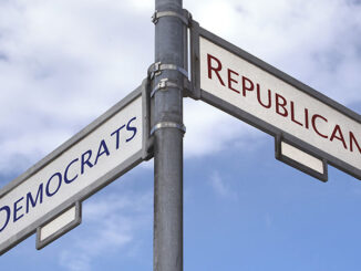 Street sign in crossroad with illustration choice for Democrats and Republicans in US elections.