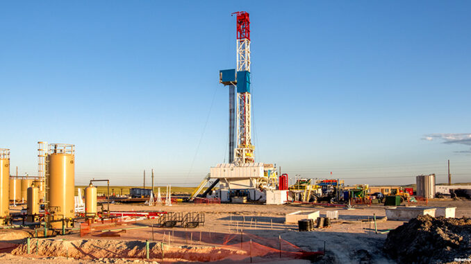 Fracking Fracking Drill Rig on the Prairie at Dusk