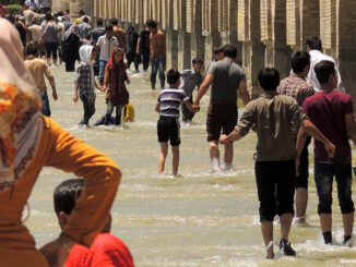 Iran children having fun in river beach, Isfahan