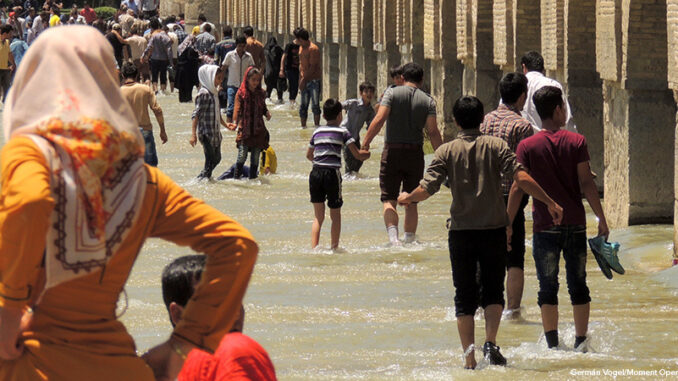 Iran children having fun in river beach, Isfahan Iran children having fun in river beach, Isfahan