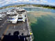 Sailors man the rails aboard the aircraft carrier USS Abraham Lincoln