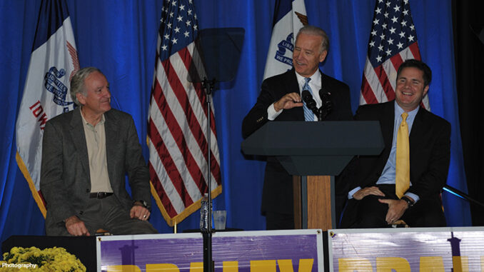 Tom Harkin, Joe Biden, and Bruce Braley at mid-term election rally Vice President Joe Biden (center), Senator Tom Harkin (left), and Congressman Bruce Braley (right), on stage at a 2010 mid-term election political rally in Dubuque, Iowa.