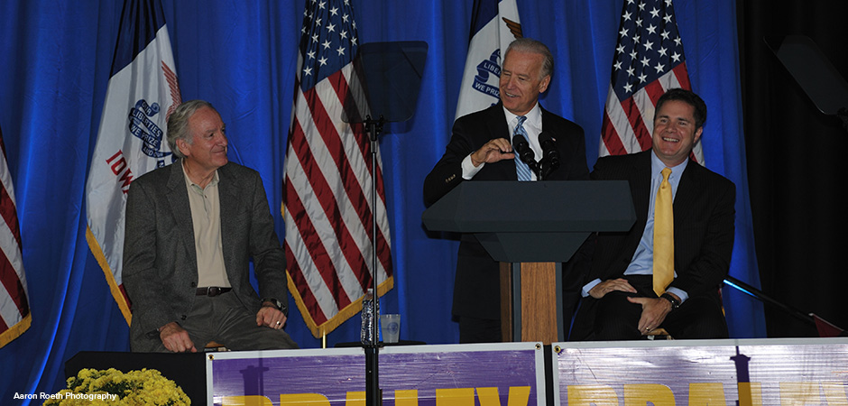 Vice President Joe Biden (center), Senator Tom Harkin (left), and Congressman Bruce Braley (right), on stage at a 2010 mid-term election political rally in Dubuque, Iowa.