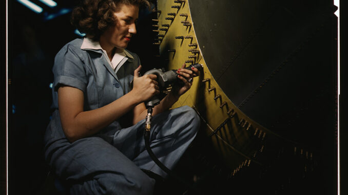 Riveter at work on Consolidated bomber, Consolidated Aircraft Corp., Fort Worth, Texas Riveter at work on Consolidated bomber, Consolidated Aircraft Corp., Fort Worth, Texas