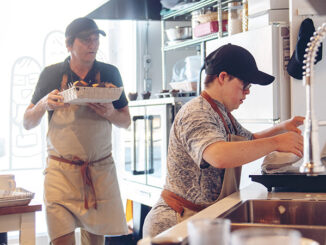 Restaurant workers in a commercial kitchen