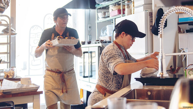 Small business family created for disable people Restaurant workers in a commercial kitchen