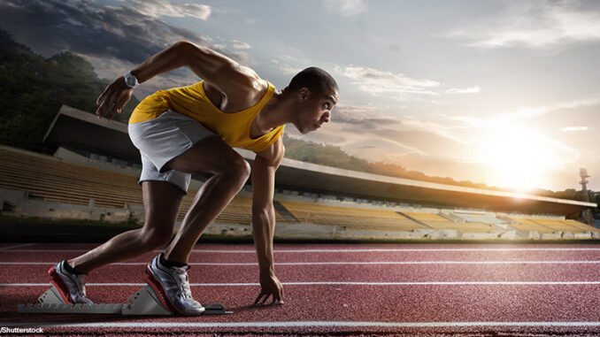 033020_02P_FS Sprinter leaving starting blocks on the running track