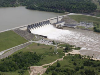 Aerial view of water being released from the Lake Eufaula Dam