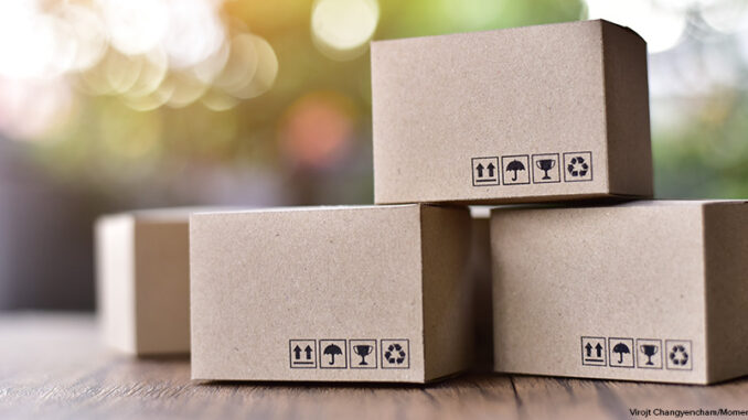Shipping delivery and logistic concept Shipping and delivery of postal boxes on a porch