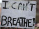 Close-up view of a sign reading "I Can't Breathe"