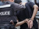 police officers arresting someone