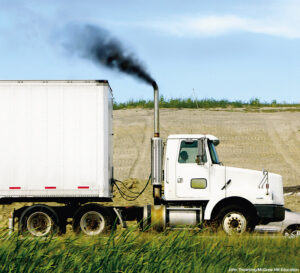 semitruck with gas fumes flowing from exhaust pipe