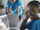 children learning in school setting