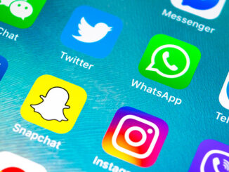 iPhone screen showing a variety of social media app icons