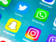 iPhone screen showing a variety of social media app icons