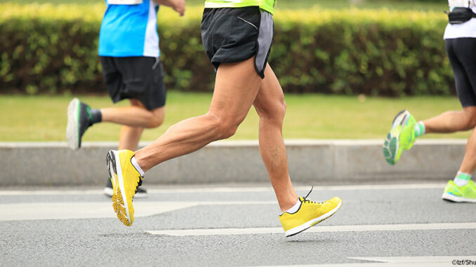 photo of runners from the waist down, focused on moving legs