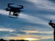 Drone device being used by person