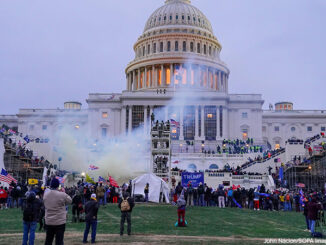 6th Jan, 2021. the U.S. Capitol Building is clouded by tear gas during protest