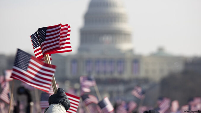 President Barack Obama's Presidential Inauguration at Capitol Building, Washington DC flag waving crowds at Presidential Inauguration at Capitol Building, Washington D.C.