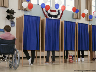 People voting in polling place