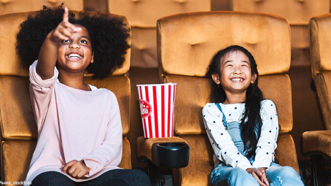 032921_02P_FS girls sitting in a movie theater