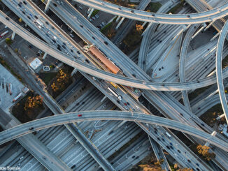Aerial view of highway interchange in cityscape