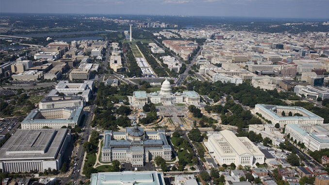 Aerial view of Washington, D.C., looking west, with Library of Congress Thomas Jefferson Building in center
