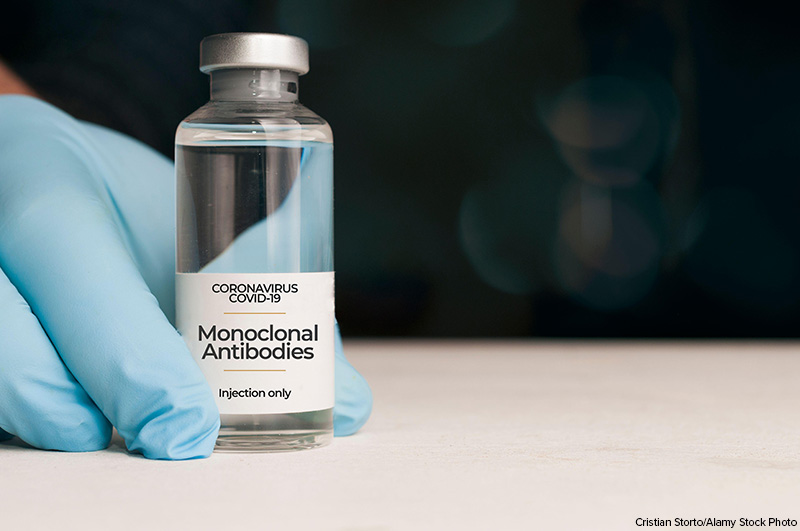 Doctor hold a vial of monoclonal antibodies , a new treatment for coronavirus Covid-19