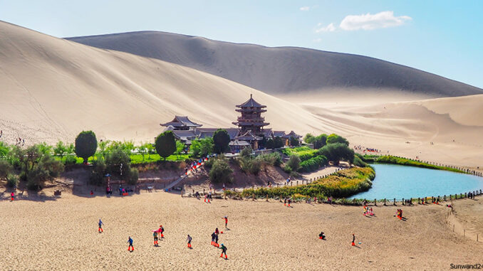 042621_01P_FS an oasis and a pagoda in China's Gobi Desert