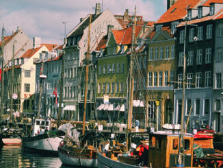 Boats in a canal in front of buildings, Copenhagen, Denmark