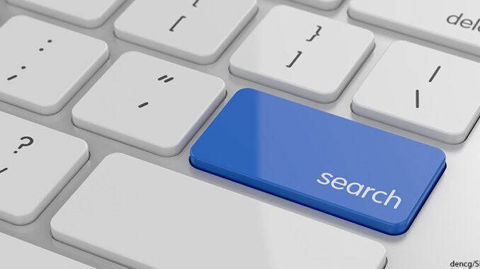 Search button on keyboard with soft focus Search button on keyboard