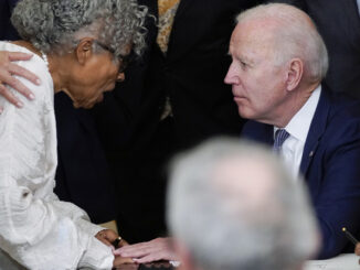 President Joe Biden speaks with Opal Lee after he signed the Juneteenth National Independence Day Act on June 17, 2021.