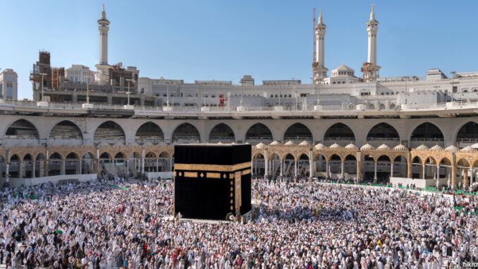 MECCA, SAUDI ARABIA - JANUARY 29: Muslim pilgrims from all around the World revolving around the Kaaba on January 29, 2017 in Mecca Saudi Arabia. Muslim people praying together at holy place. view of a crowd of praying Muslim pilgrims from all around the world revolving around the Kaaba