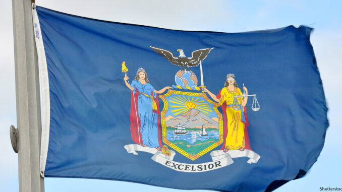 081621_02P_FS Flag of New York State in blue sky background