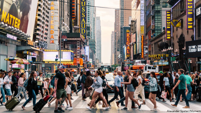 Crowds of people crossing street on zebra crossing in New York, USA Crowds of people crossing street on zebra crossing in New York CIty.