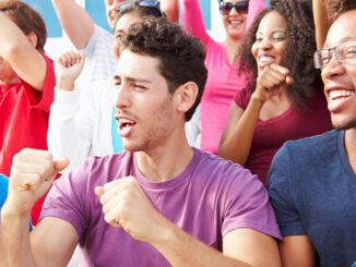 Audience cheering in a crowd