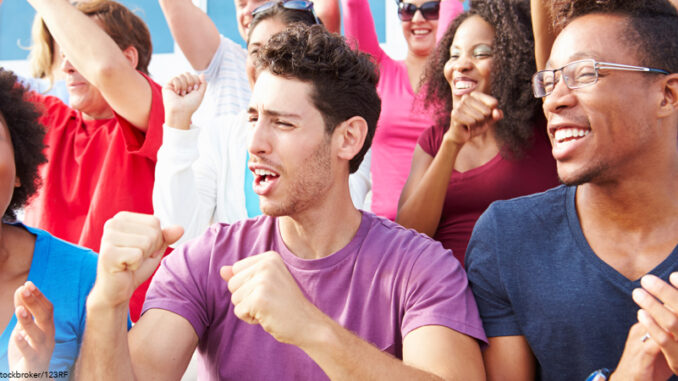 Audience Cheering At Outdoor Concert Performance Audience cheering in a crowd