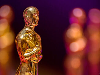 A group of golden award statuettes