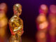 A group of golden award statuettes