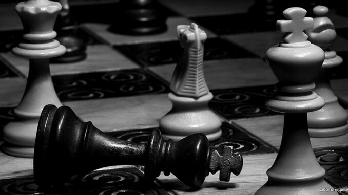 022822_04P_FS black and white photograph of chess pieces on a chess board