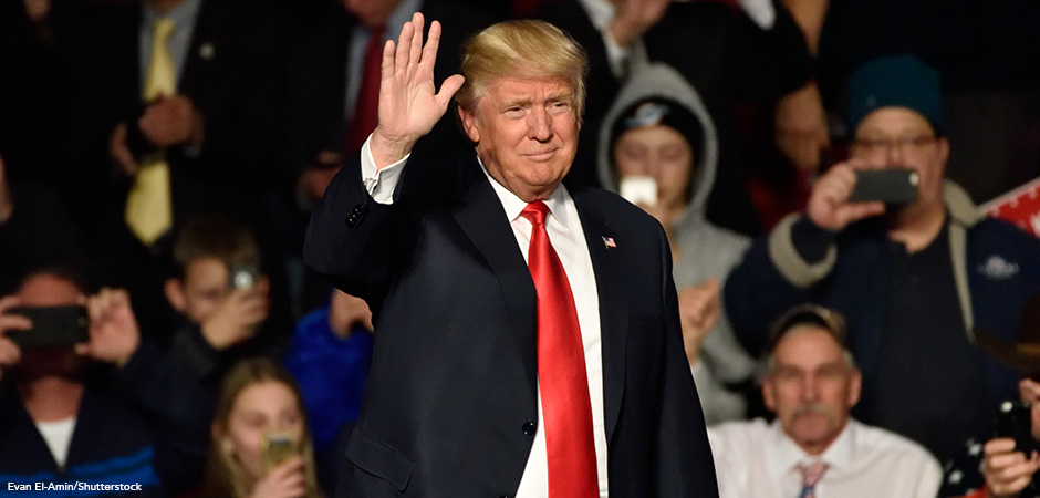 HERSHEY, PA – DECEMBER 15, 2016: President-Elect Donald Trump waves to the crowd as he arrives on stage to deliver a speech at a Thank You tour held at the Giant Center