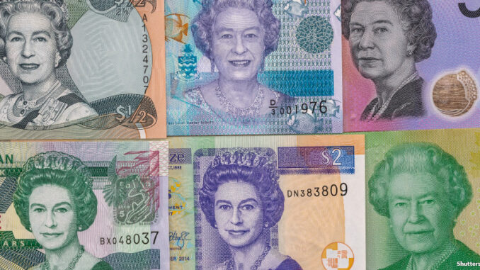 060622_02P_FS Bank notes from the United Kingdom featuring Queen Elizabeth II's portrait from various points in her life..